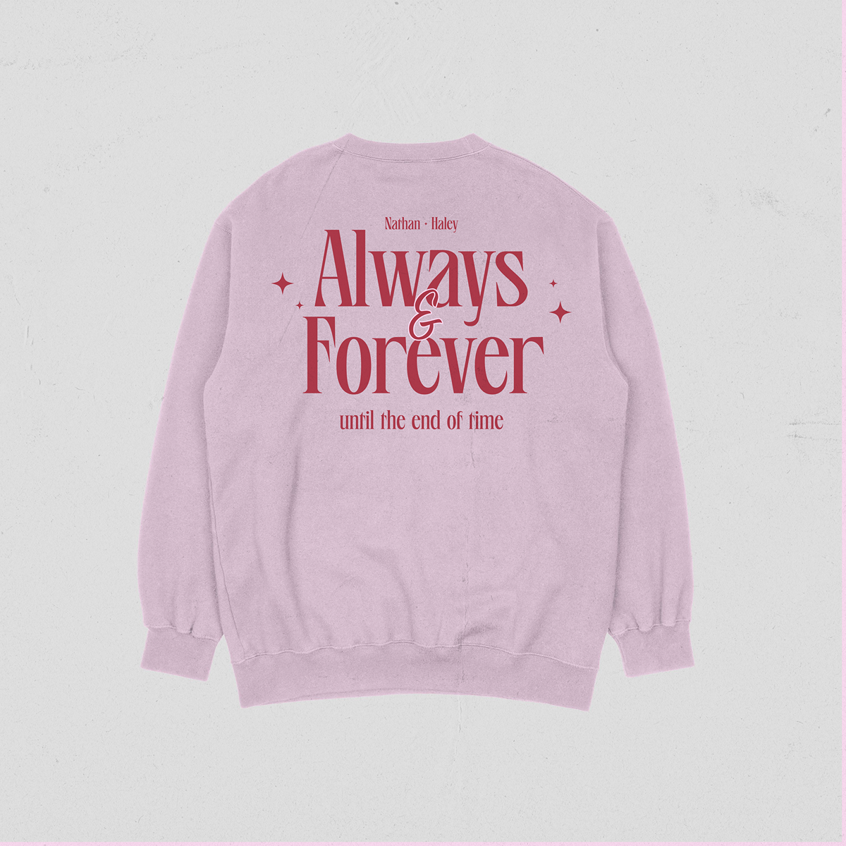 Pink sweatshirt with 'Always & Forever, until the end of time' text on a light gray background