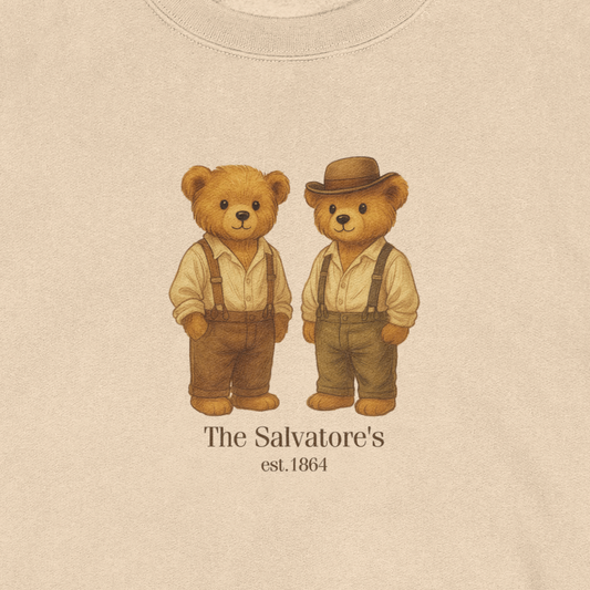 Two teddy bears in vintage attire with 'The Salvatore's est. 1864' text on a beige background.