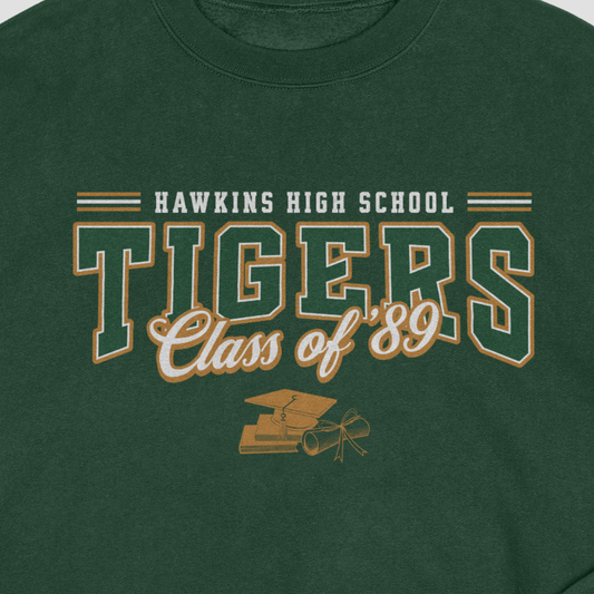 Green sweatshirt with 'Hawkins High School Tigers Class of '89' text and graduation cap graphic.