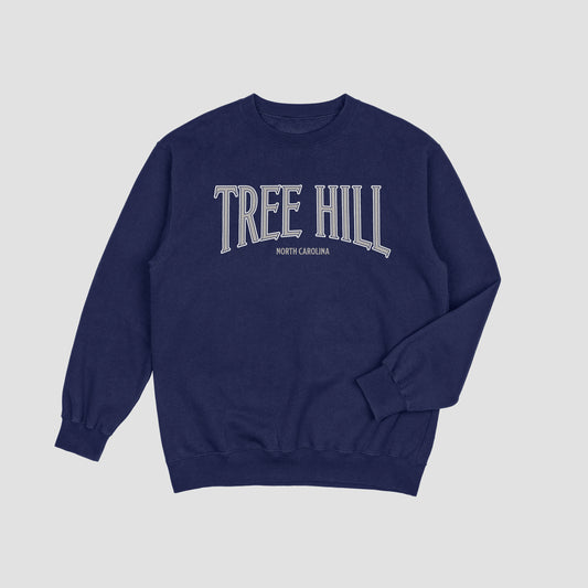 Navy blue sweatshirt with 'TREE HILL' text on a light gray background