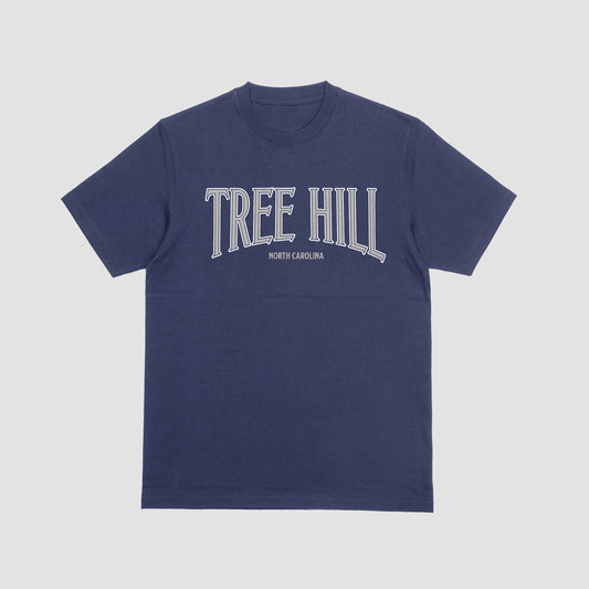 Navy blue t-shirt with 'TREE HILL NORTH CAROLINA' text on a light gray background