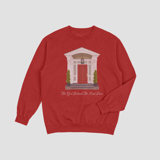 Red sweatshirt with a graphic design of a red door on a light gray background