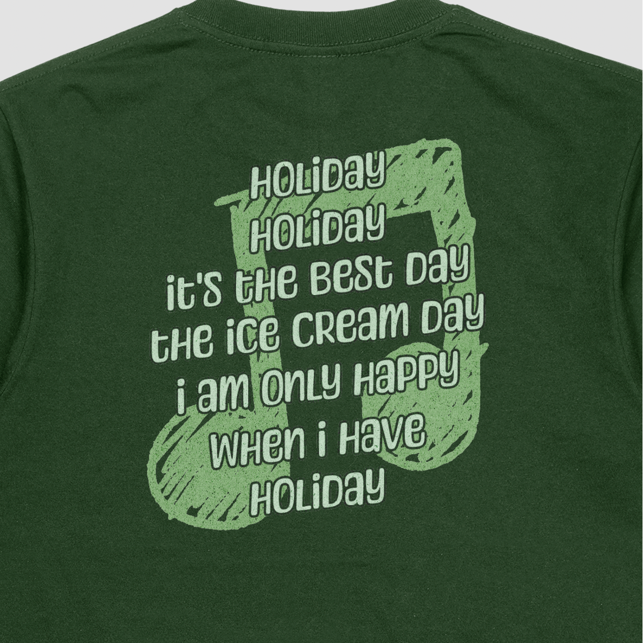 Green t-shirt with humorous text and ice cream graphic on a plain background