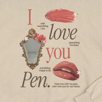 Beige t-shirt with decorative text and graphics on a beige background