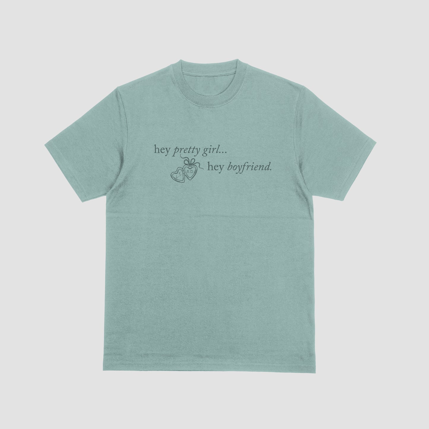 Light green t-shirt with text on a light gray background