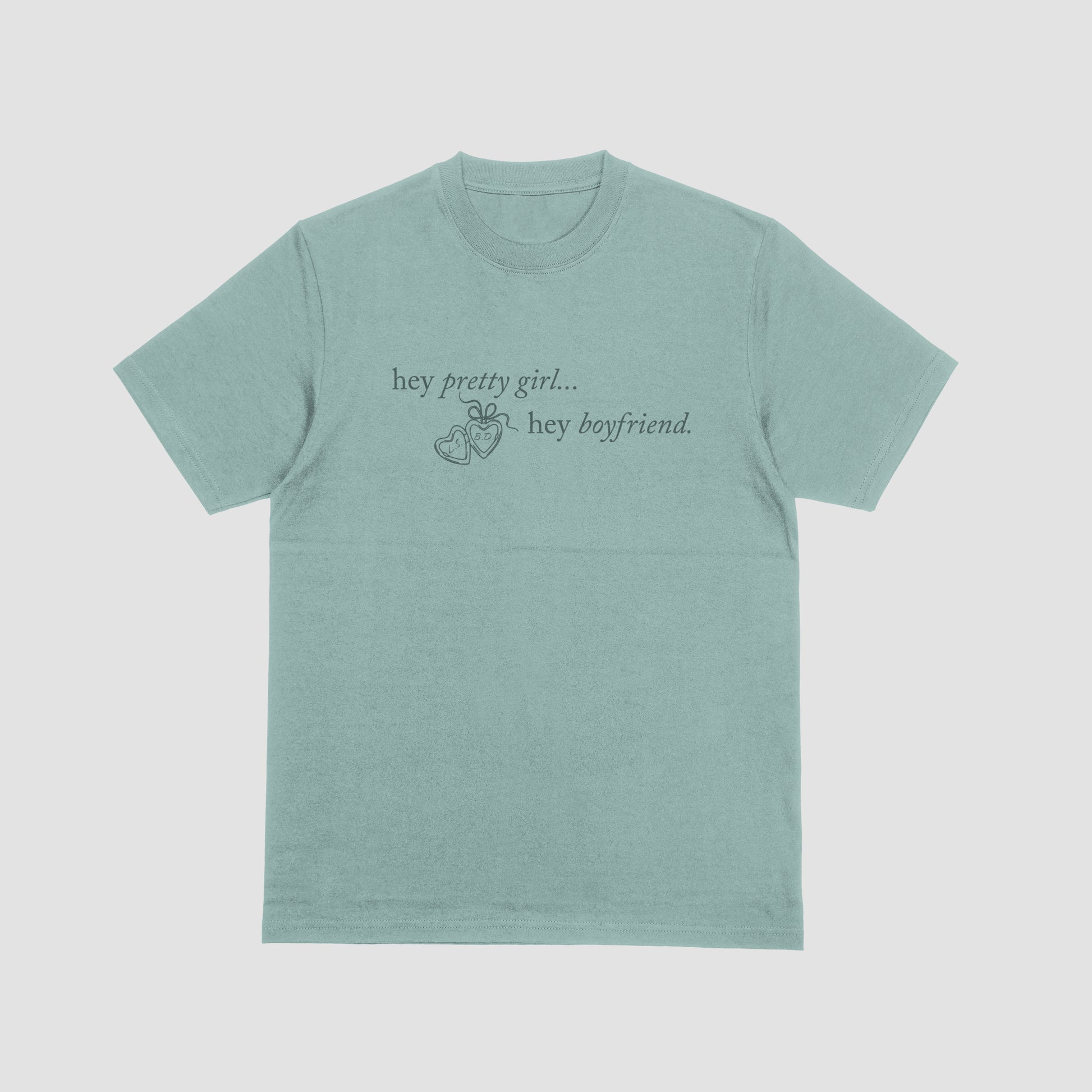 Light green t-shirt with text on a light gray background