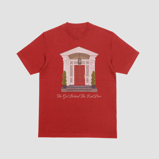Red t-shirt with architectural design and text on a light gray background