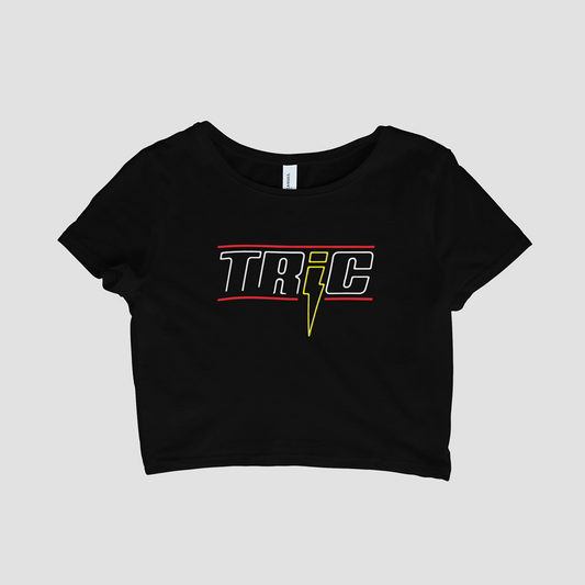 Black crop top with 'TRIC' logo on a light gray background