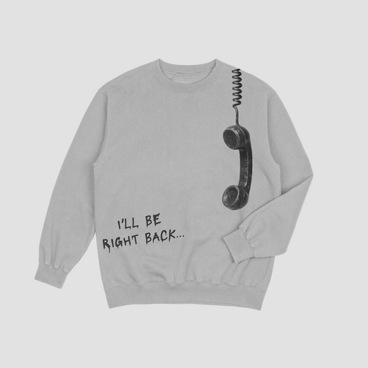 Gray sweatshirt with a phone receiver and 'I'll be right back...' text on a white background